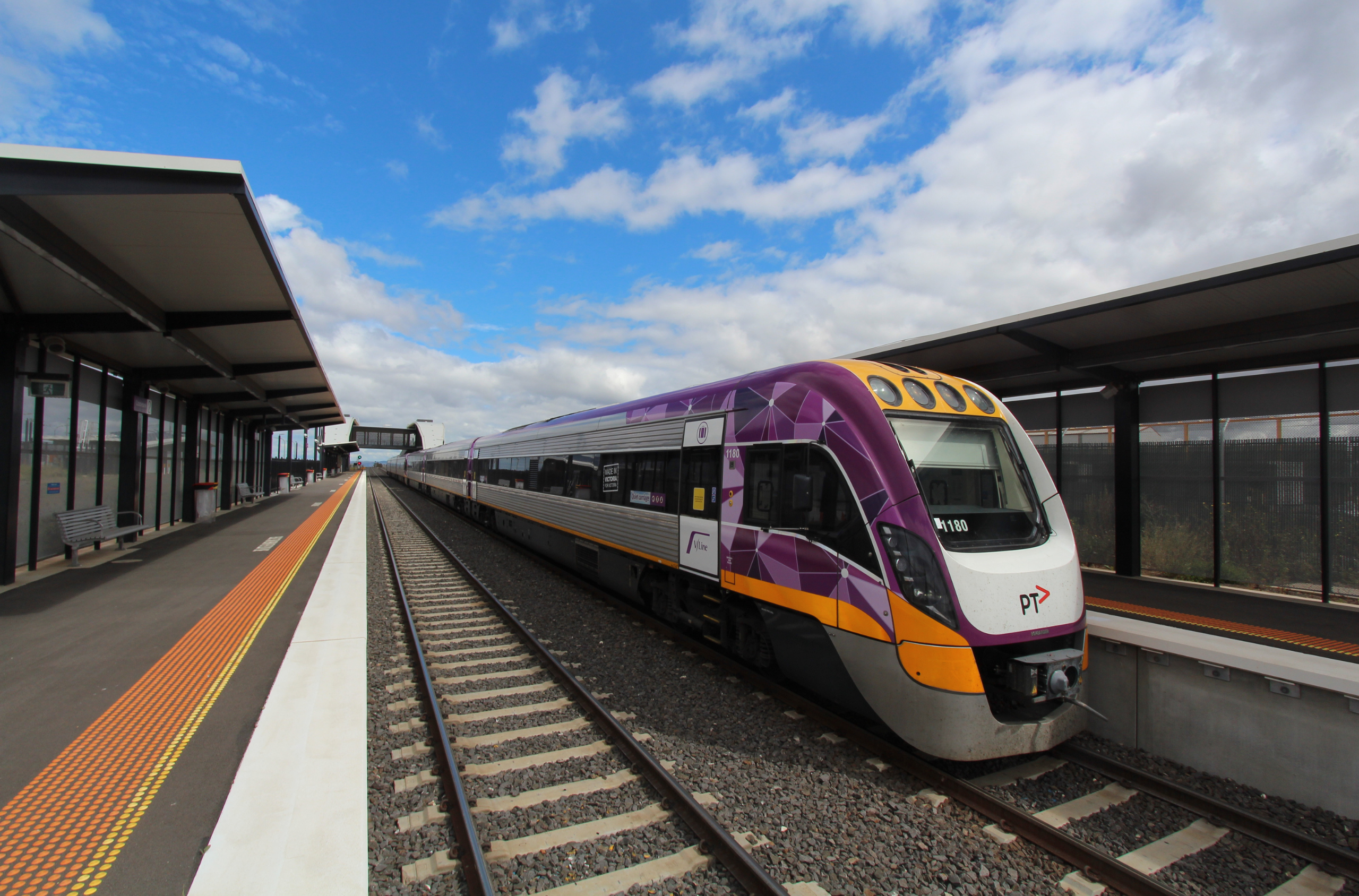 Metro Line train on tracks at station